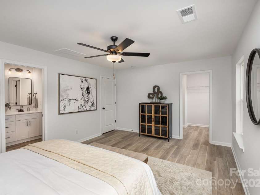2008 Sadler Woods Lane, Charlotte, NC 28214.  MLS# CAR4233955, YatesRealty ID 2536. Spacious primary suite. Representative Photo