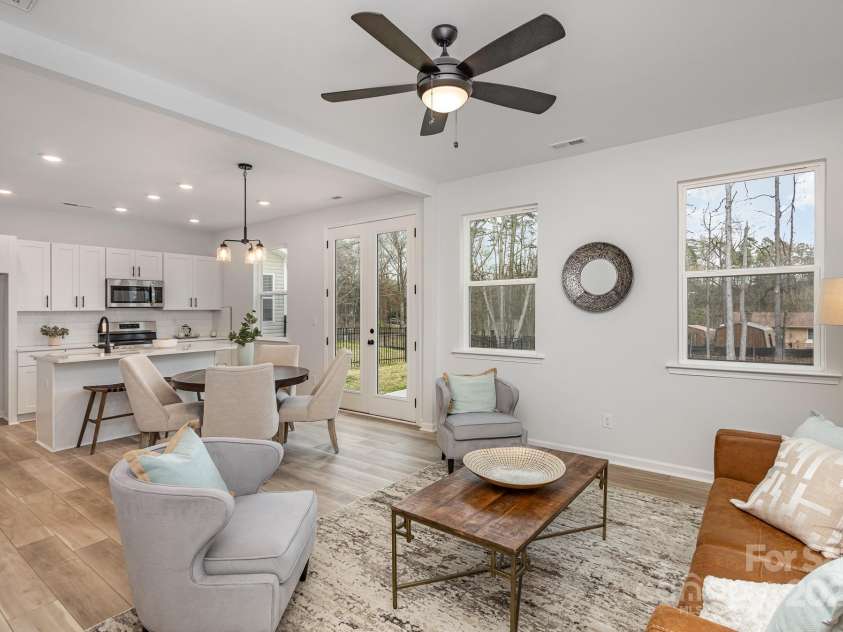 2008 Sadler Woods Lane, Charlotte, NC 28214.  MLS# CAR4233955, YatesRealty ID 2536. Vinyl plank flooring throughout the first floor. Representative Photo
