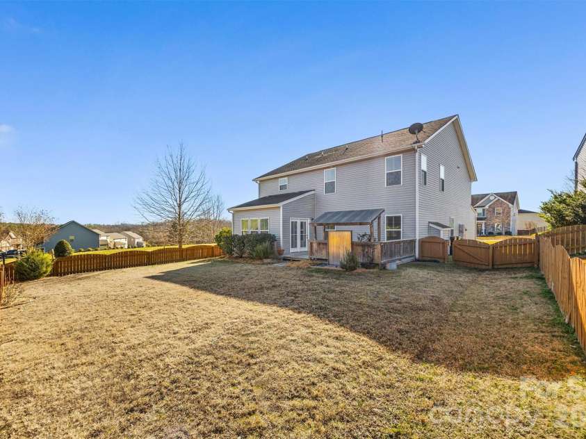 7397 Mill Ruins Avenue, Concord, NC 28025.  MLS# CAR4336222, YatesRealty ID 25360. Backyard