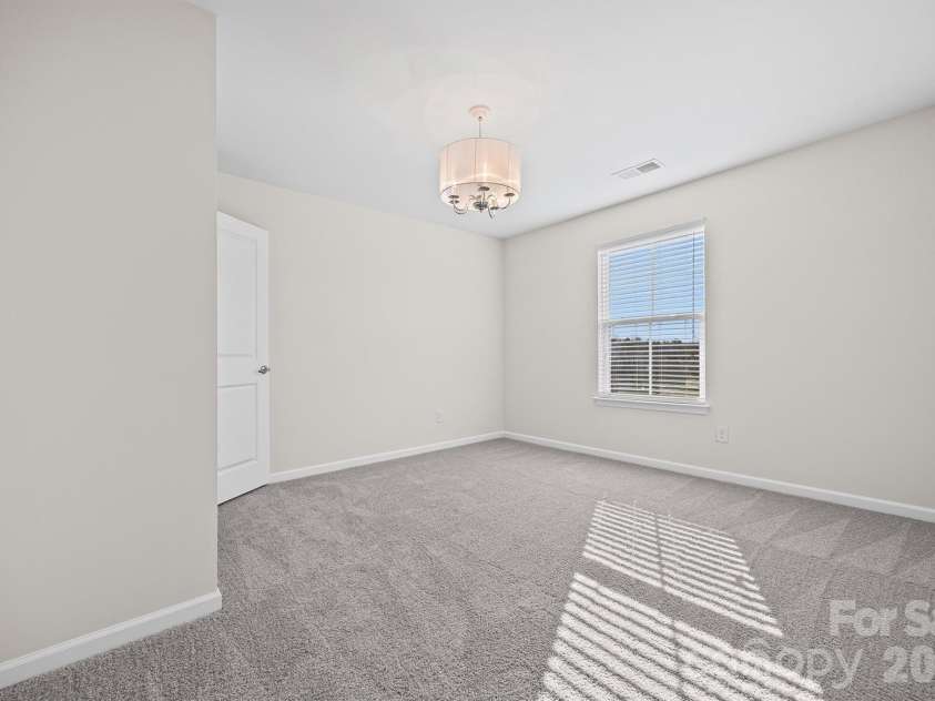 7397 Mill Ruins Avenue, Concord, NC 28025.  MLS# CAR4336222, YatesRealty ID 25360. Bedroom 3 w/Walk-in Closet