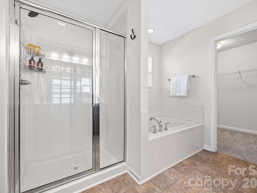 7397 Mill Ruins Avenue, Concord, NC 28025.  MLS# CAR4336222, YatesRealty ID 25360. Primary Bath