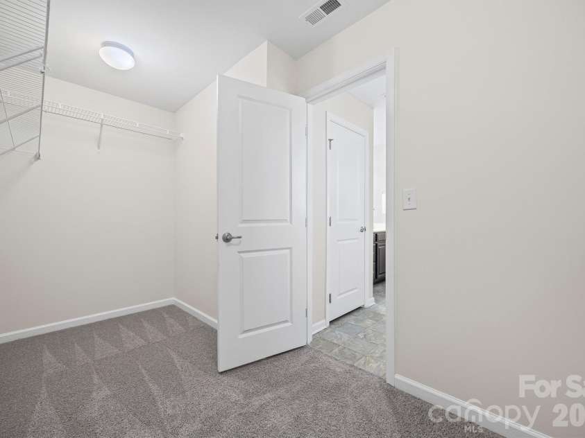 7397 Mill Ruins Avenue, Concord, NC 28025.  MLS# CAR4336222, YatesRealty ID 25360. Primary Walk-in Closet #1