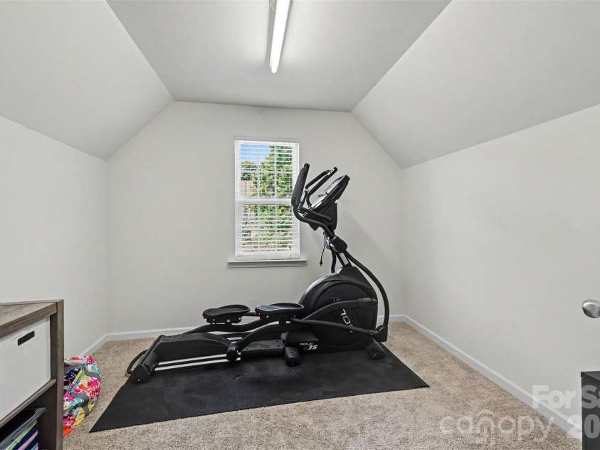 9107 Kensington Forest Drive, Harrisburg, NC 28075.  MLS# CAR4377399, YatesRealty ID 25360. Additional Flex Area off the Primary Suite