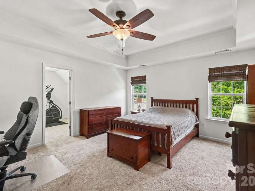 9107 Kensington Forest Drive, Harrisburg, NC 28075.  MLS# CAR4377399, YatesRealty ID 25360. Oversized Primary Suite with a separate Flex Room