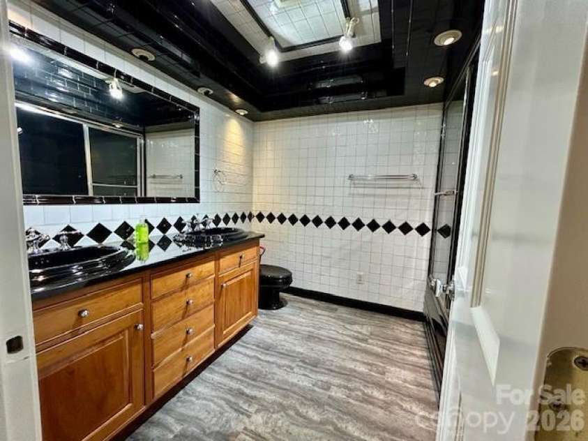 1319 Cathey Road, Charlotte, NC 28214.  MLS# CAR4366814, YatesRealty ID 25362. Hall Bathroom 