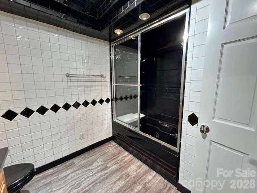 1319 Cathey Road, Charlotte, NC 28214.  MLS# CAR4366814, YatesRealty ID 25362. Hall Bathroom