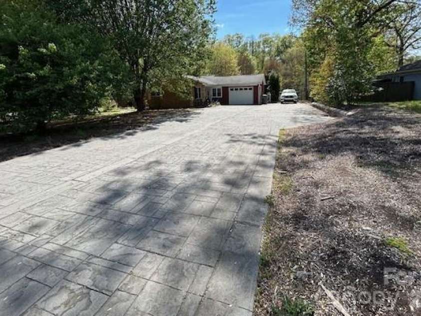 1319 Cathey Road, Charlotte, NC 28214.  MLS# CAR4366814, YatesRealty ID 25362. Oversized Driveway