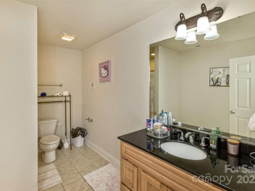 33 Stone House Road, Arden, NC 28704.  MLS# CAR4261250, YatesRealty ID 25362. Basement en suite bathroom