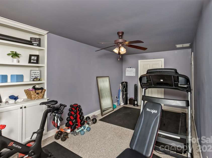 33 Stone House Road, Arden, NC 28704.  MLS# CAR4261250, YatesRealty ID 25362. Built in book shelves