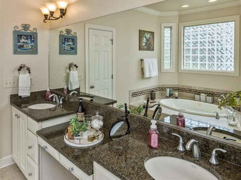 33 Stone House Road, Arden, NC 28704.  MLS# CAR4261250, YatesRealty ID 25362. Primary bath vanity