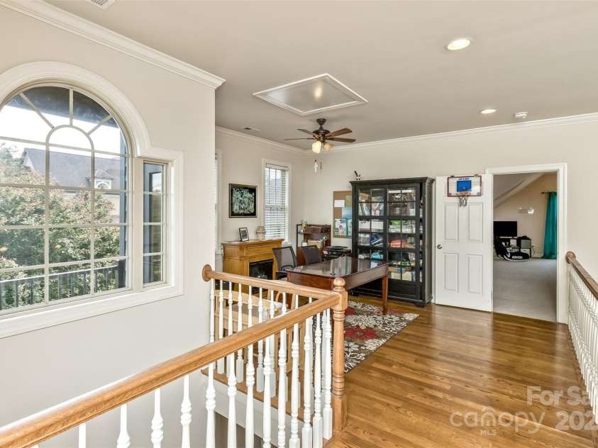 33 Stone House Road, Arden, NC 28704.  MLS# CAR4261250, YatesRealty ID 25362. Upstairs loft for an office or get-away