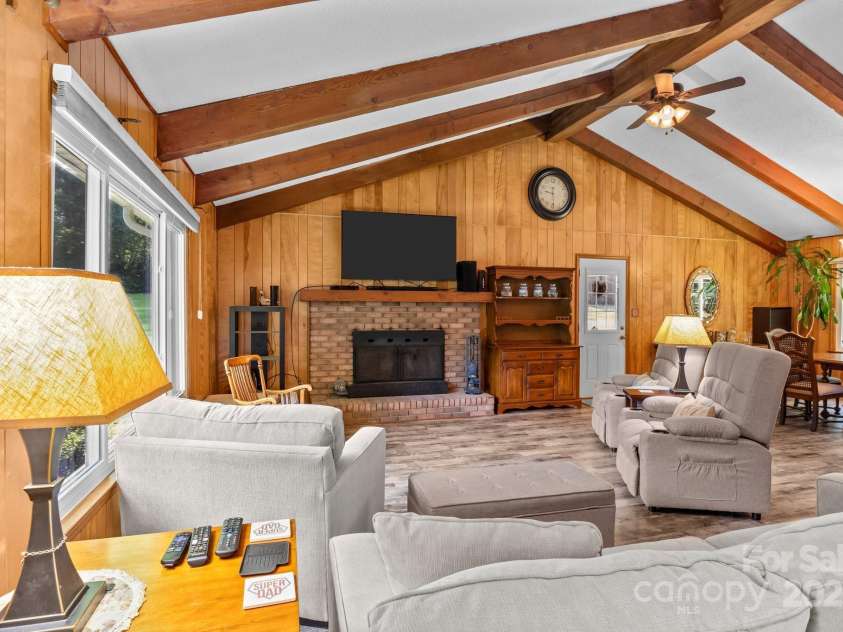 143 Bostian Lake Road, Statesville, NC 28677.  MLS# CAR4275561, YatesRealty ID 25365. Living Area With Vaulted Ceilings