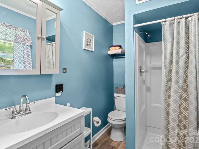 143 Bostian Lake Road, Statesville, NC 28677.  MLS# CAR4275561, YatesRealty ID 25365. Primary Bathroom