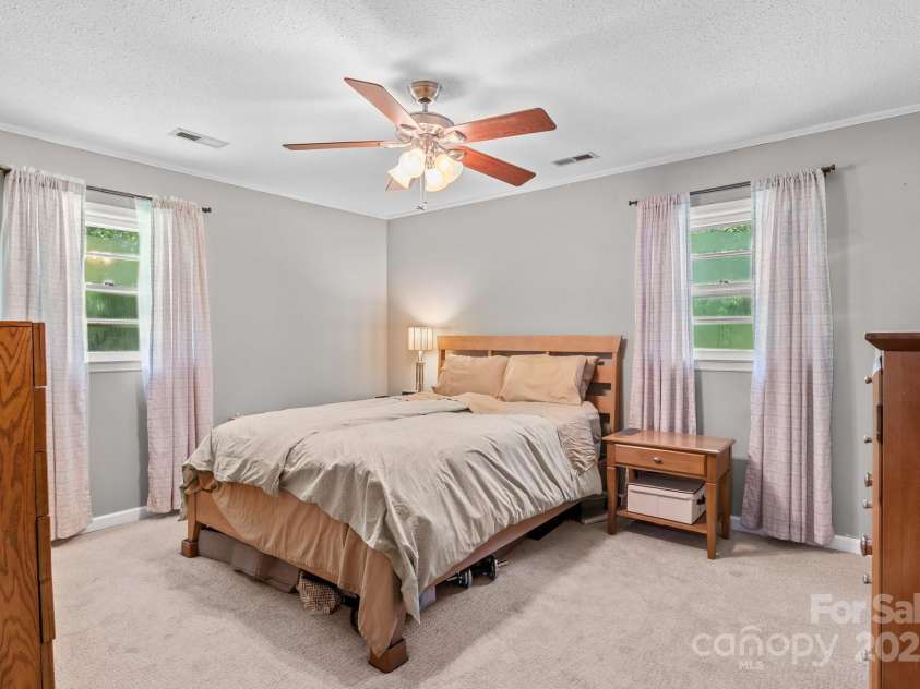 143 Bostian Lake Road, Statesville, NC 28677.  MLS# CAR4275561, YatesRealty ID 25365. Primary Bedroom