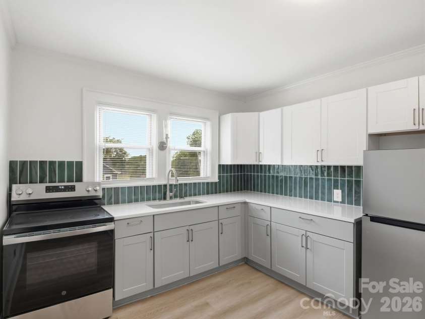 49 Corban Avenue, Concord, NC 28025.  MLS# CAR4382158, YatesRealty ID 25365. Unit 12 kitchen