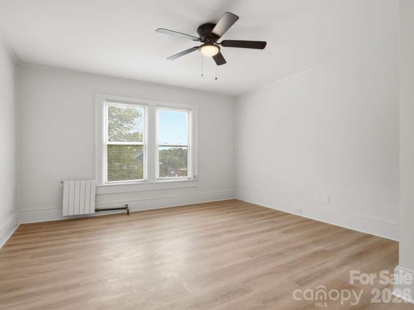 49 Corban Avenue, Concord, NC 28025.  MLS# CAR4382158, YatesRealty ID 25365. Unit 12 - living/bed 2