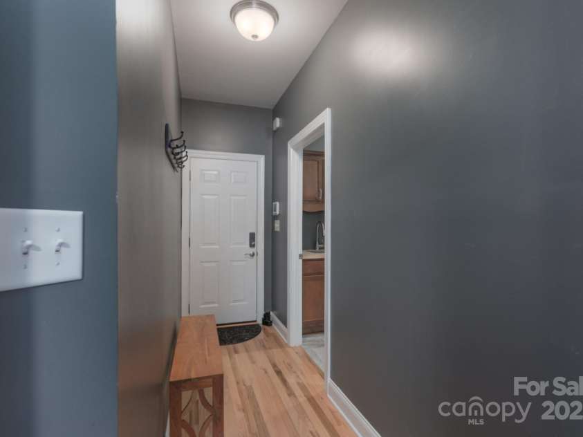 1643 Essex Hall Drive, Rock Hill, SC 29730.  MLS# CAR4258475, YatesRealty ID 25366. Hallway leading to Laundry Room and Garage