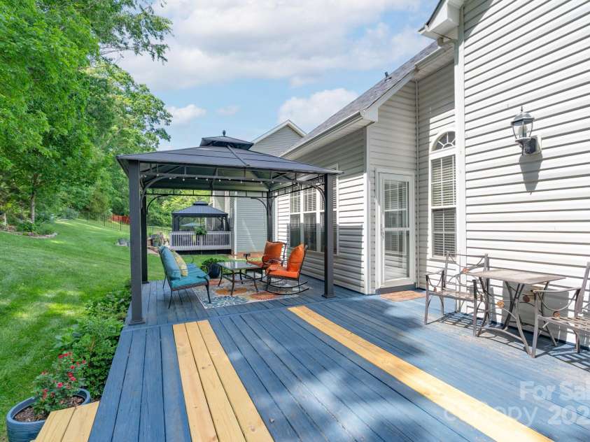 1643 Essex Hall Drive, Rock Hill, SC 29730.  MLS# CAR4258475, YatesRealty ID 25366. Rear Deck with damaged boards replaced.