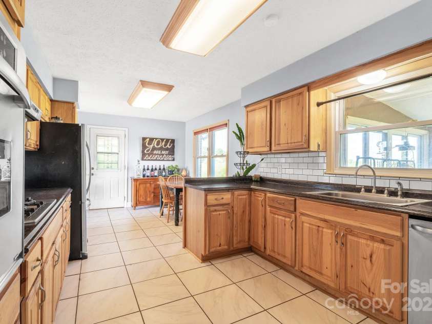 550 Old Newfound Road, Leicester, NC 28748.  MLS# CAR4249093, YatesRealty ID 25367. 