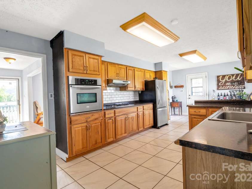 550 Old Newfound Road, Leicester, NC 28748.  MLS# CAR4249093, YatesRealty ID 25367. 