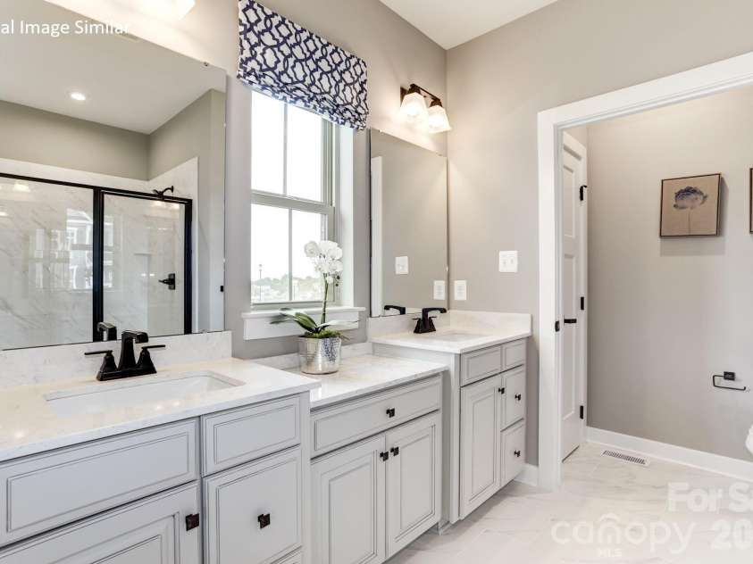 909 Heathway Drive, Charlotte, NC 28213.  MLS# CAR4386135, YatesRealty ID 25368. Representative Photo Only