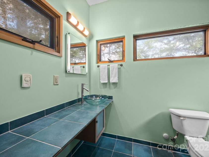 27 Rosebud Lane, Fairview, NC 28730.  MLS# CAR4273615, YatesRealty ID 25369. 