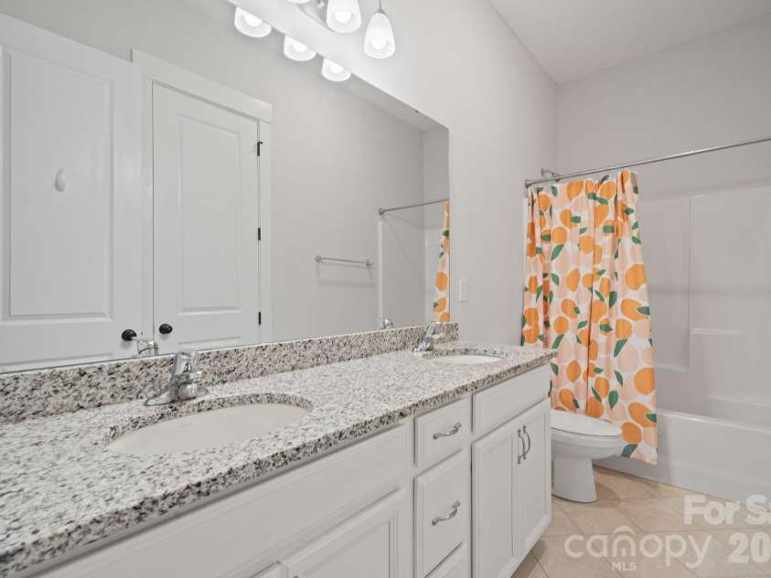 4689 Kingswood Drive, Fort Mill, SC 29707.  MLS# CAR4360868, YatesRealty ID 25369. Bathroom #2 ON MAIN FLOOR