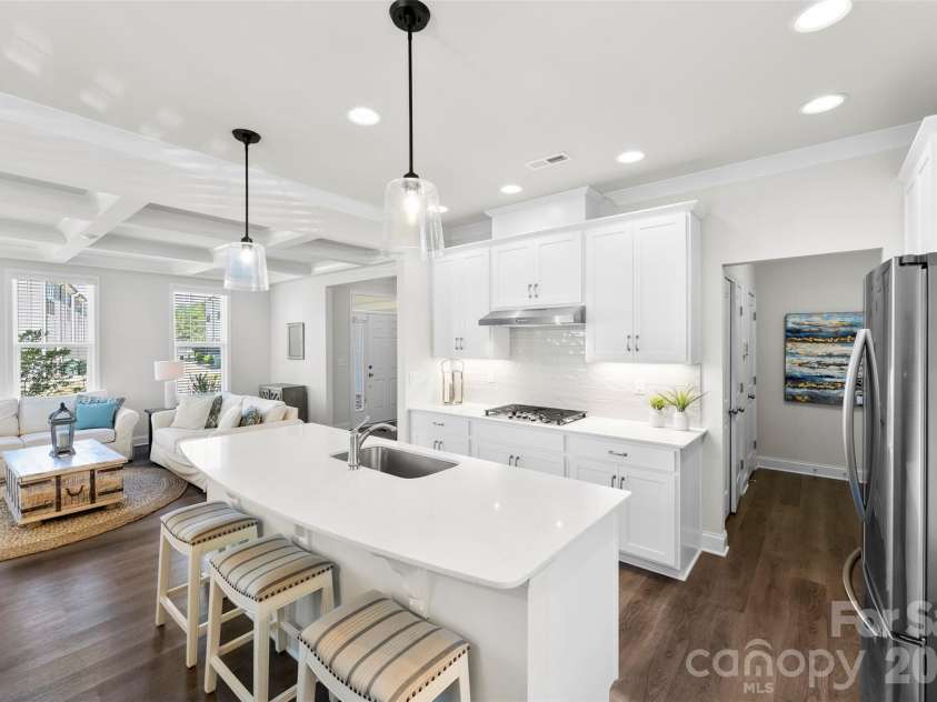 10141 Rainier Trail Drive, Huntersville, NC 28078.  MLS# CAR4375749, YatesRealty ID 25370. This stunning home truly is magazine-worthy, boasting an abundance of luxury upgrades and a thoughtfully designed open floor plan that is perfectly suited for hosting memorable gatherings and creating lasting 