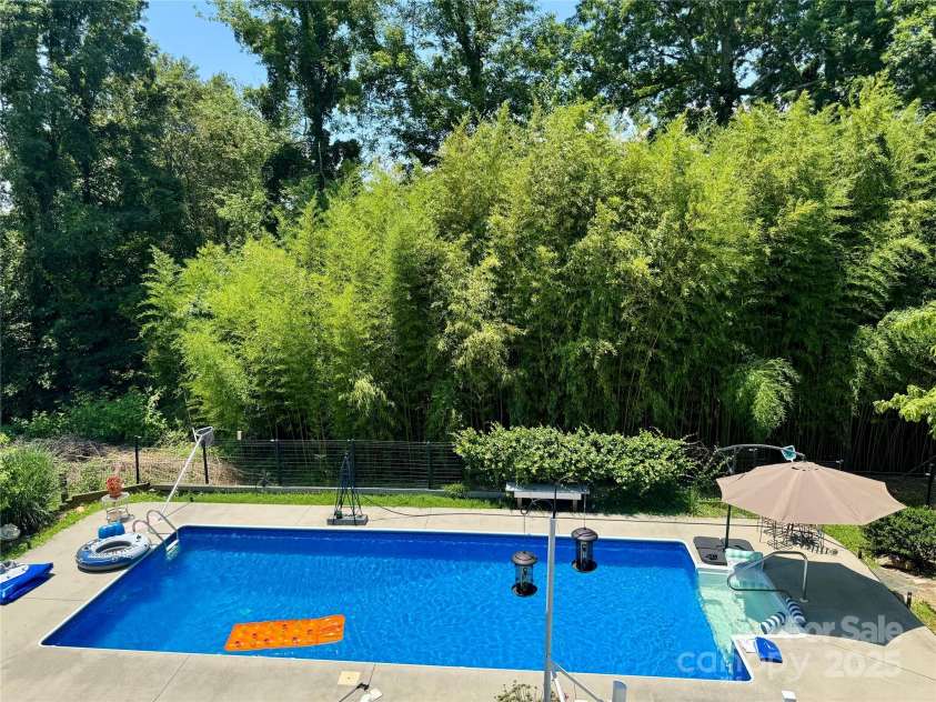 227 Reep Drive, Morganton, NC 28655.  MLS# CAR4312133, YatesRealty ID 25372. Private pool area. All the pool covers, accessories and furniture to stay.