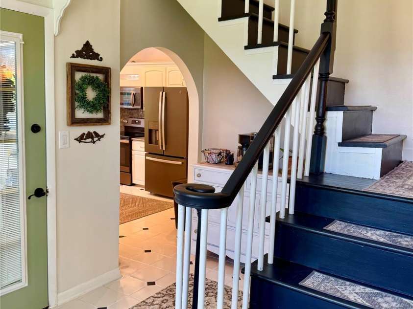 227 Reep Drive, Morganton, NC 28655.  MLS# CAR4312133, YatesRealty ID 25372. Stairs in main house that lead to primary bedroom and the Eagle's Nest Deck