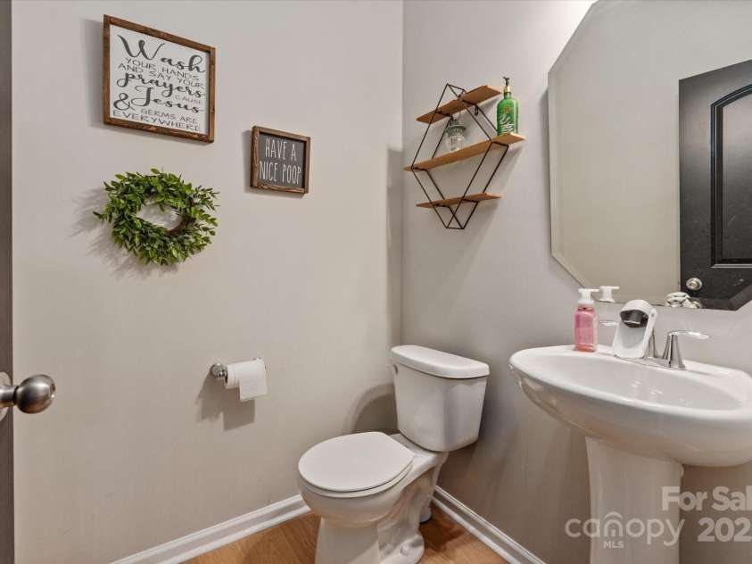 389 Whispering Hills Drive, Locust, NC 28097.  MLS# CAR4273635, YatesRealty ID 25374. Half bath