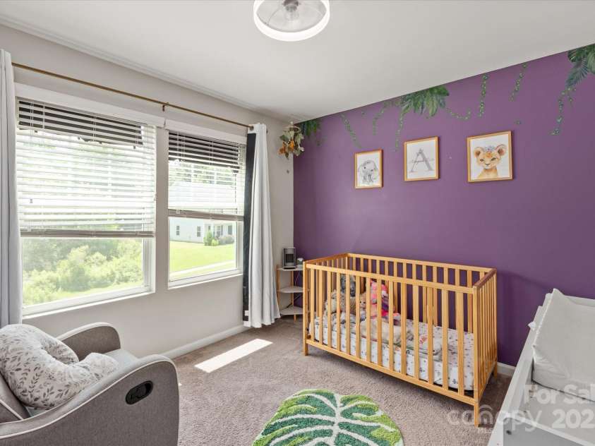 389 Whispering Hills Drive, Locust, NC 28097.  MLS# CAR4273635, YatesRealty ID 25374. One of two secondary bedrooms