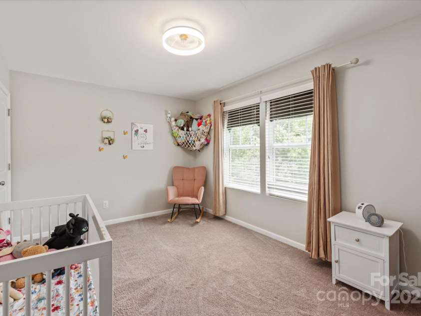 389 Whispering Hills Drive, Locust, NC 28097.  MLS# CAR4273635, YatesRealty ID 25374. One of two secondary bedrooms