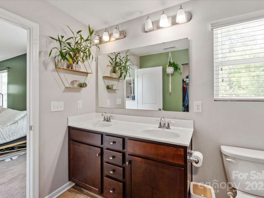 389 Whispering Hills Drive, Locust, NC 28097.  MLS# CAR4273635, YatesRealty ID 25374. Owner's bathroom