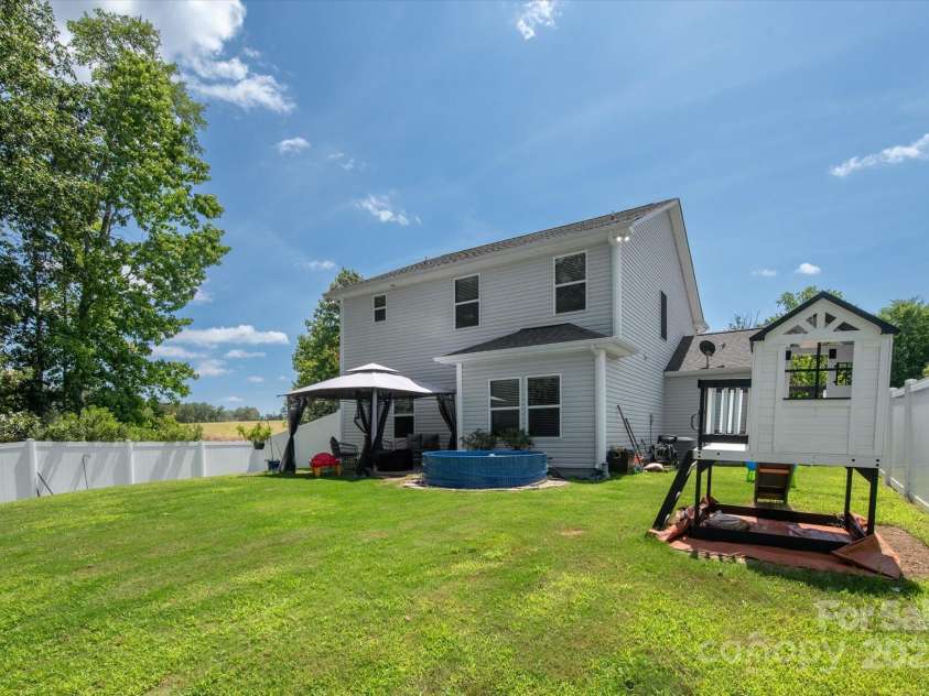 389 Whispering Hills Drive, Locust, NC 28097.  MLS# CAR4273635, YatesRealty ID 25374. Private lot at the end of the street