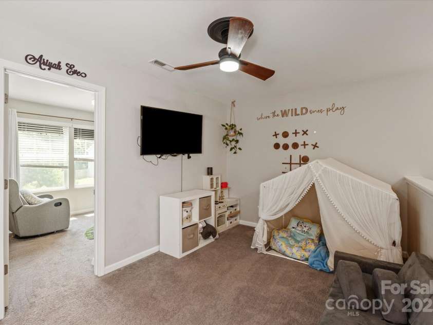 389 Whispering Hills Drive, Locust, NC 28097.  MLS# CAR4273635, YatesRealty ID 25374. Second story loft