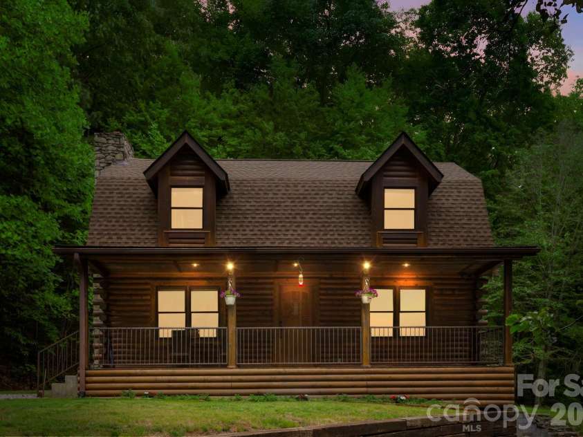 5 Rustic Ridge Drive, Candler, NC 28715.  MLS# CAR4379747, YatesRealty ID 25379. 5 Rustic Ridge Drive at sunset! 