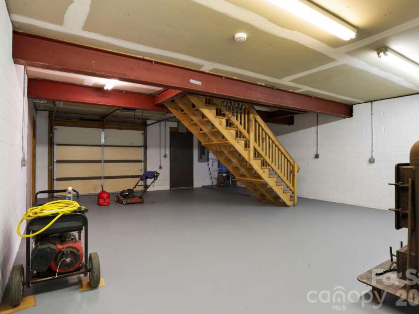 5 Rustic Ridge Drive, Candler, NC 28715.  MLS# CAR4379747, YatesRealty ID 25379. Basement/garage