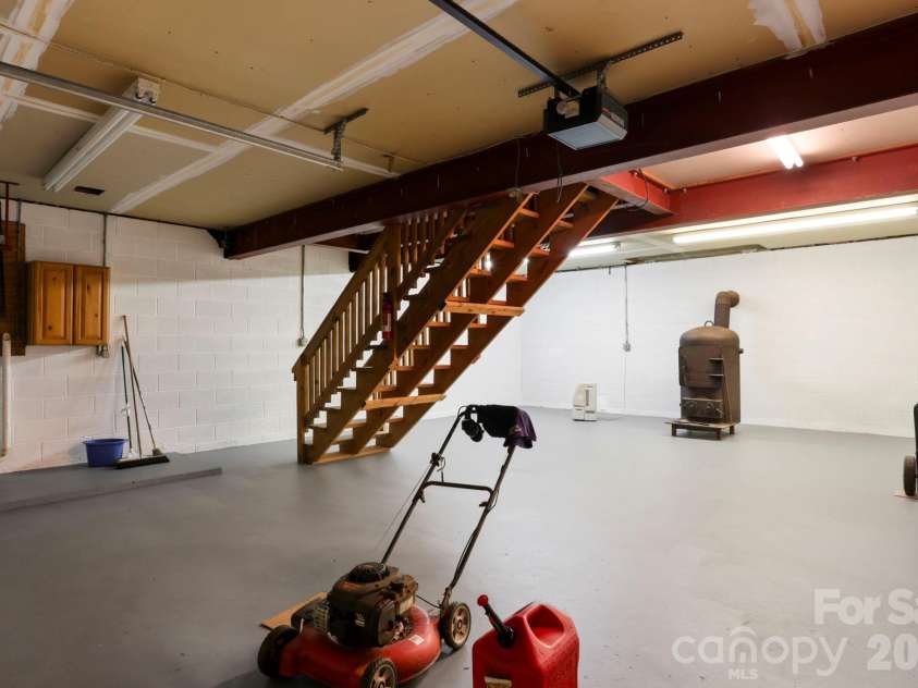 5 Rustic Ridge Drive, Candler, NC 28715.  MLS# CAR4379747, YatesRealty ID 25379. Basement/garage