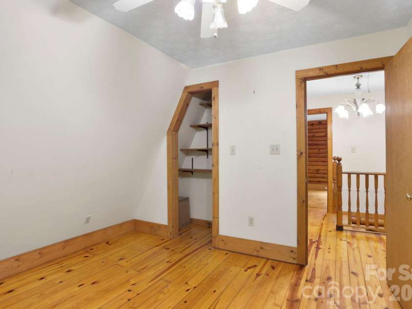 5 Rustic Ridge Drive, Candler, NC 28715.  MLS# CAR4379747, YatesRealty ID 25379. Bedroom #3 with storage