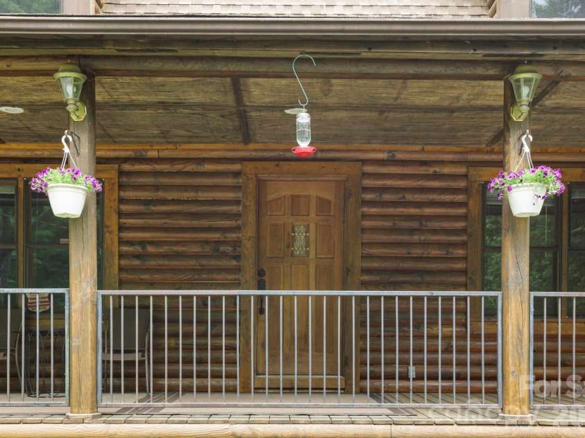 5 Rustic Ridge Drive, Candler, NC 28715.  MLS# CAR4379747, YatesRealty ID 25379. Front porch