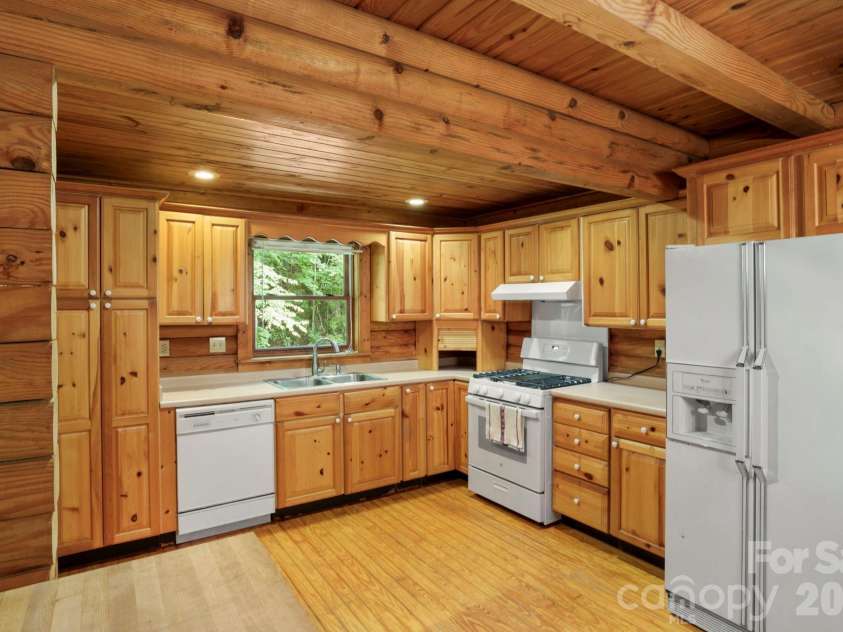 5 Rustic Ridge Drive, Candler, NC 28715.  MLS# CAR4379747, YatesRealty ID 25379. Kitchen with ample storage space