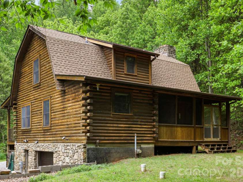 5 Rustic Ridge Drive, Candler, NC 28715.  MLS# CAR4379747, YatesRealty ID 25379. Rear of home and level backyard