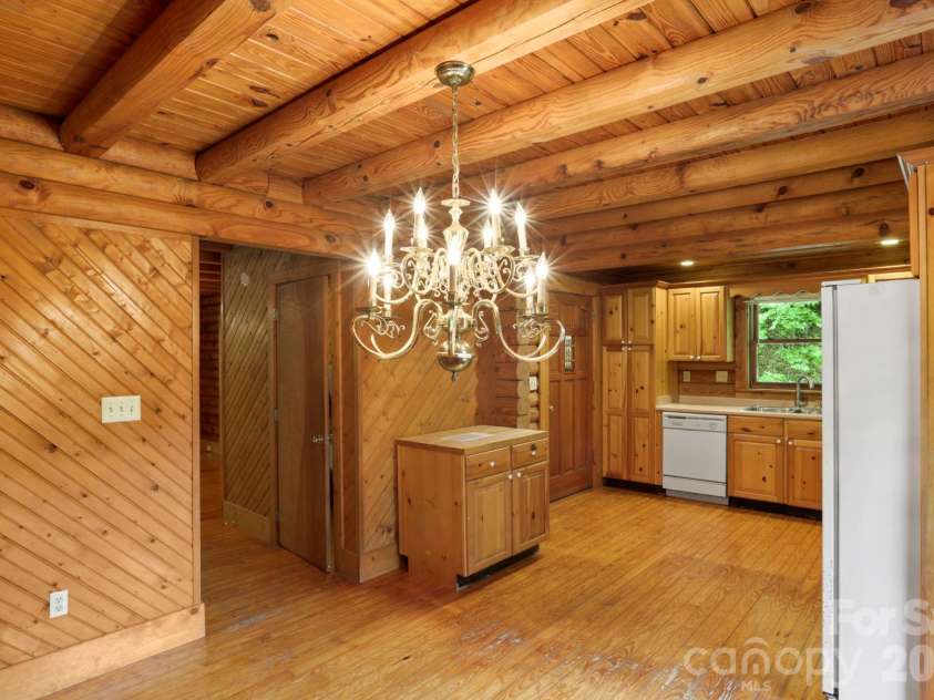 5 Rustic Ridge Drive, Candler, NC 28715.  MLS# CAR4379747, YatesRealty ID 25379. Vintage chandelier