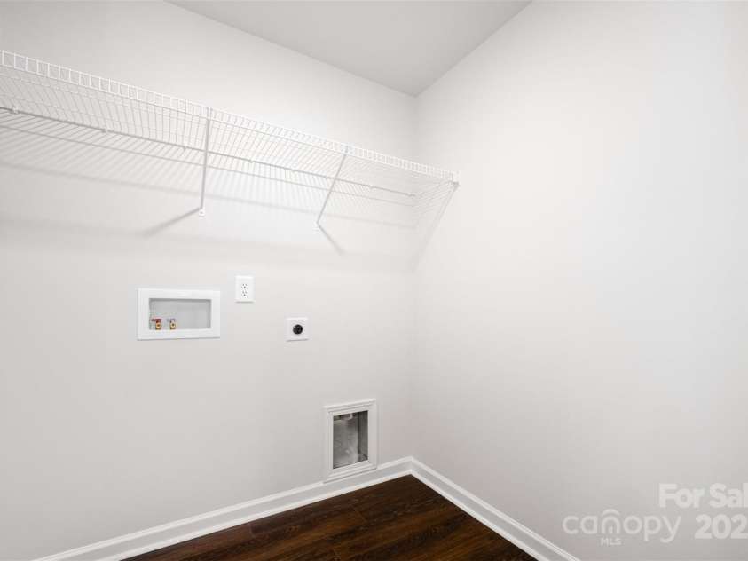 3001 Sadler Woods Lane, Charlotte, NC 28214.  MLS# CAR4272760, YatesRealty ID 25380. 2nd floor Laundry. Representational Photo.