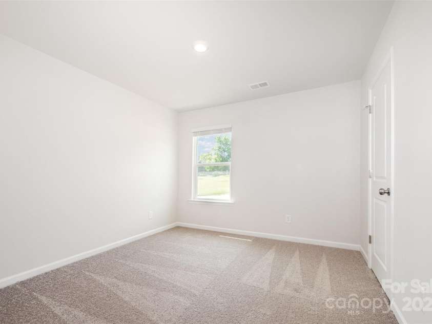 3001 Sadler Woods Lane, Charlotte, NC 28214.  MLS# CAR4272760, YatesRealty ID 25380. Spare bedroom 1. Representational Photo.