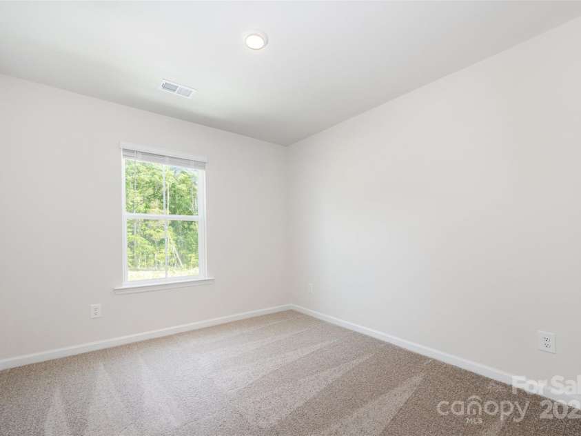 3001 Sadler Woods Lane, Charlotte, NC 28214.  MLS# CAR4272760, YatesRealty ID 25380. Spare bedroom 2. Representational Photo.