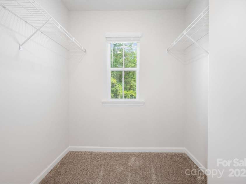 3001 Sadler Woods Lane, Charlotte, NC 28214.  MLS# CAR4272760, YatesRealty ID 25380. Walk-In Closet. Representational Photo.