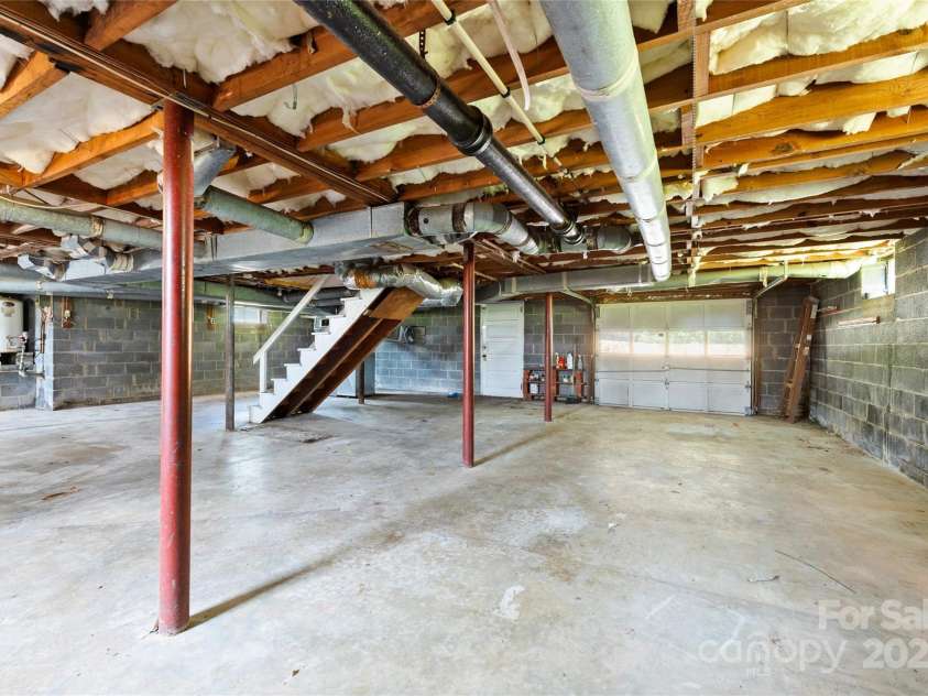 888 Monte Vista Road, Candler, NC 28715.  MLS# CAR4280575, YatesRealty ID 25386. Huge basement!