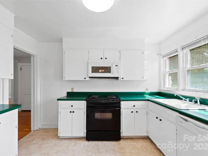 888 Monte Vista Road, Candler, NC 28715.  MLS# CAR4280575, YatesRealty ID 25386. Retro vibes!